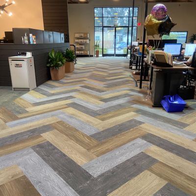 commercial wood look flooring in an office with desks